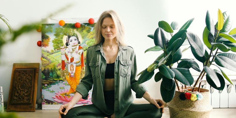 A person sitting in a meditative pose.