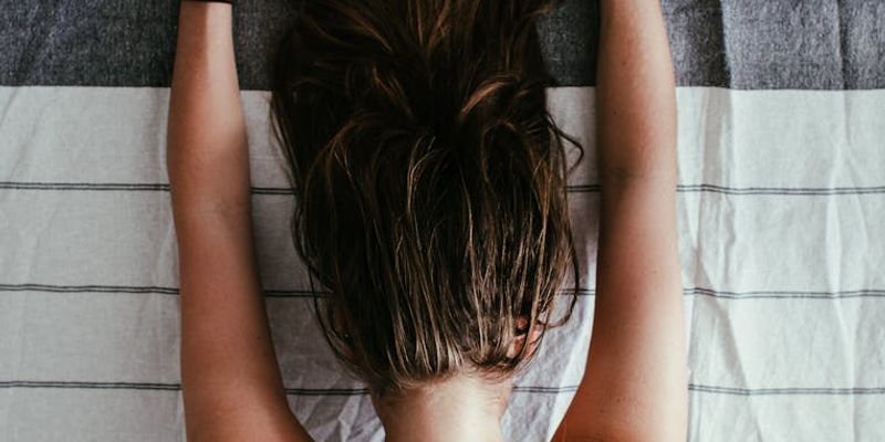 Person in a deep, relaxing stretch pose.